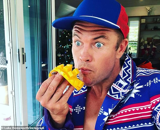 Fresh snack: Senior brother Luke, 40, also shared a photo on Instagram in which he enjoyed a mango