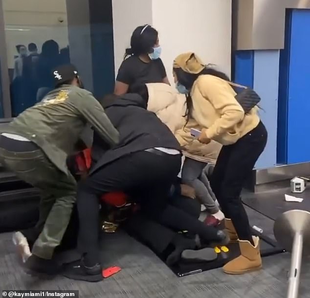 A fight erupted after a dispute over a suitcase at Detroit Metro Airport