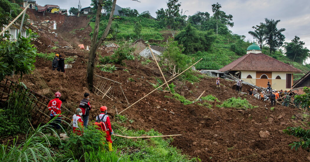 At least 12 people were killed in two landslides in Indonesia