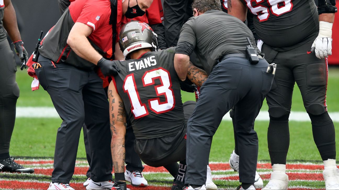Mike Evans of Tampa Bay Buccaneers hurts knee after setting a record