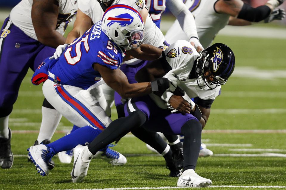 Buffalo Bills defender Jerry Hughes (55) sacks Baltimore midfielder Ravens Lamar Jackson (8).  (AP Photo / Jeffrey T. Barnes)