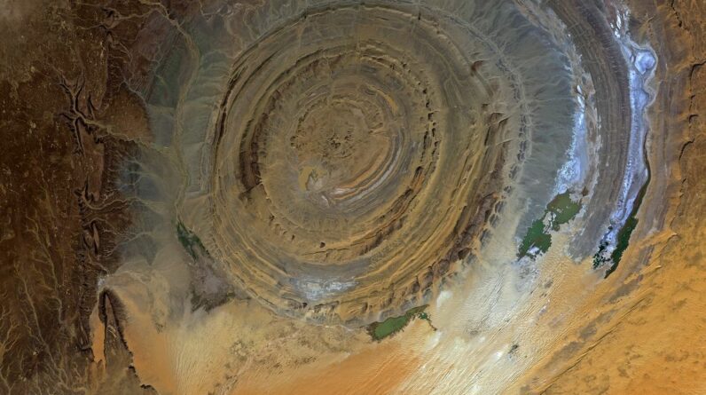 A view of the Richat structure in the Sahara desert from space.